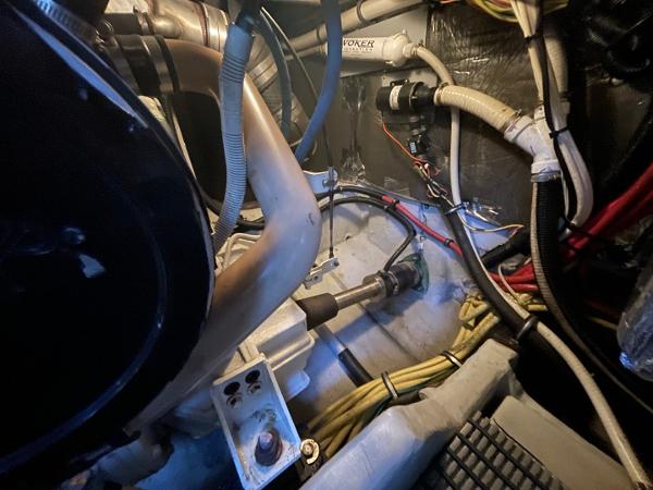 Slide: The Image of Engine room of 2004 Meridian 459 Motoryacht, showcasing mechanical components and wiring. - 49