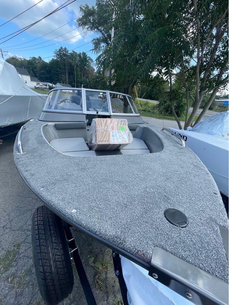 Slide: The Image of 2023 MirroCraft 1628 boat on trailer, parked outdoors. - 5