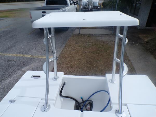Slide: The Image of 2024 Mitzi Skiffs 17cc boat with center console and storage compartment. - 13