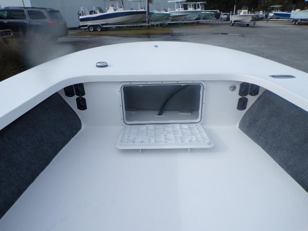 Slide: The Image of 2024 Mitzi Skiffs 17cc boat interior with storage compartment. - 4