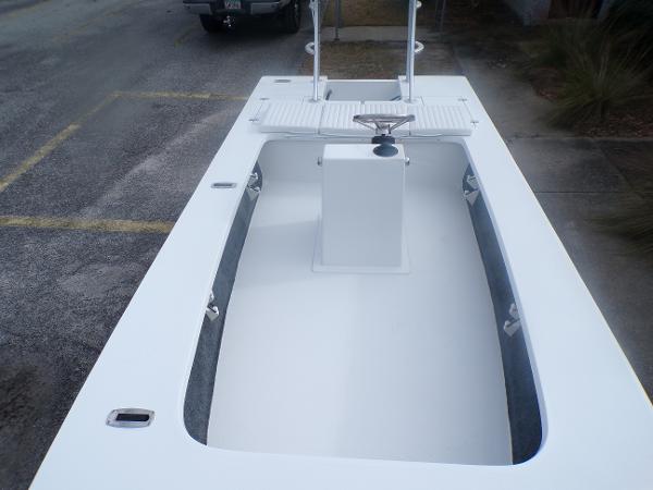 Slide: The Image of 2024 Mitzi Skiffs 17cc center console boat with spacious deck and storage compartments. - 5