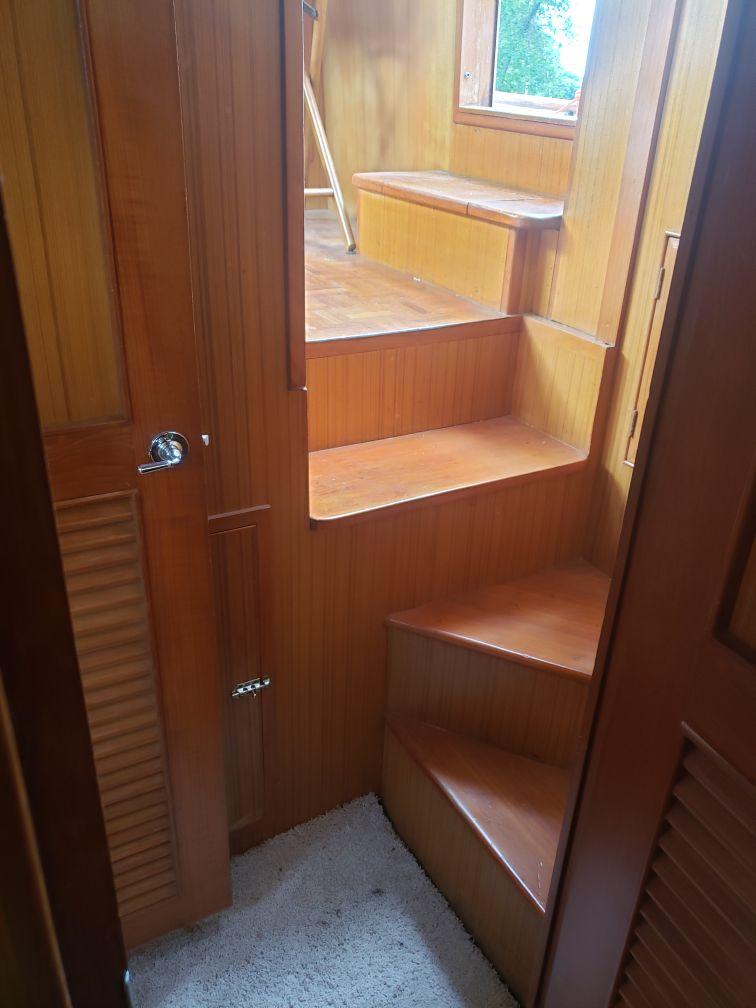 Slide: The Image of Wooden interior stairs of a 1981 Monk Comfort Monk Motorsailer 38. - 20