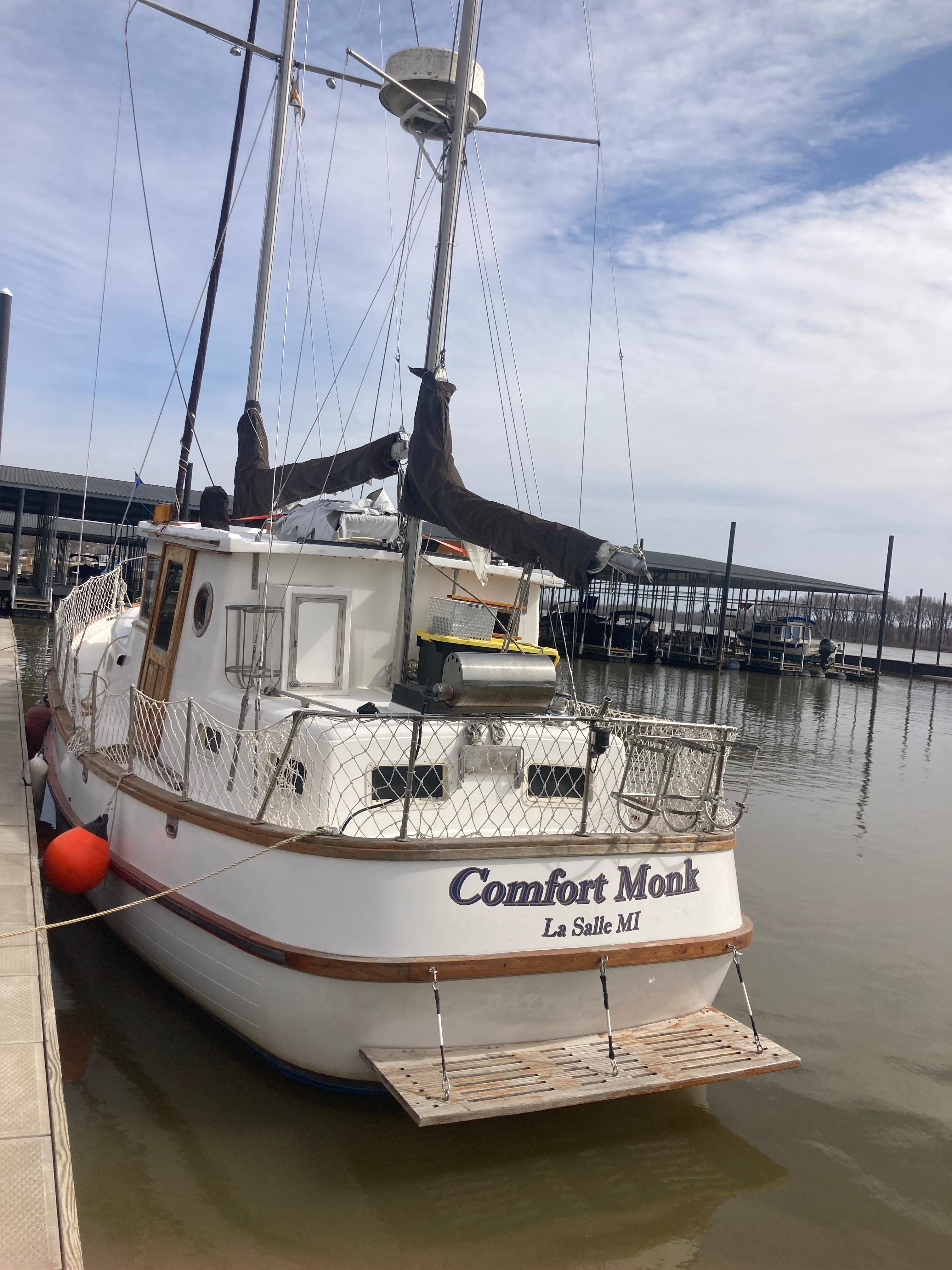 Slide: The Image of 1981 Monk Comfort Monk Motorsailer 38 docked at marina, La Salle MI. - 4