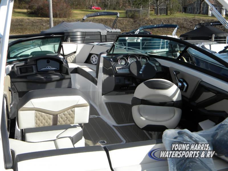 Slide: The Image of 2024 Monterey 218SS boat interior with modern dashboard and seating. - 4