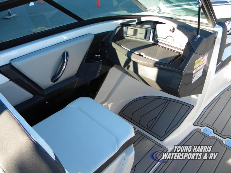 Slide: The Image of 2024 Monterey 238SS boat interior with modern dashboard and seating. - 10