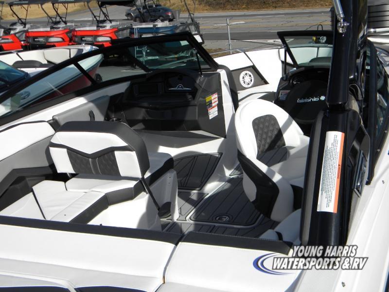Slide: The Image of 2024 Monterey 238SS boat interior with modern seating and dashboard. - 4