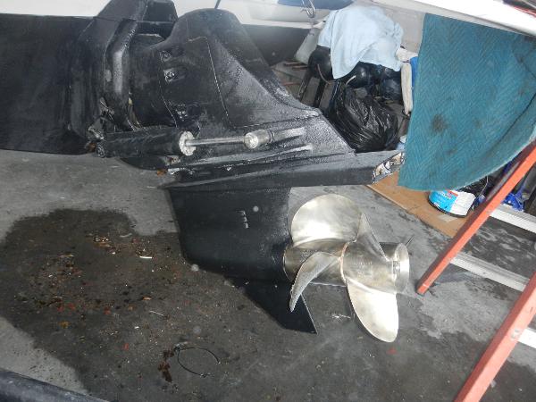 Slide: The Image of Close-up of a 2005 Monterey 248 LS boat propeller in a garage. - 8