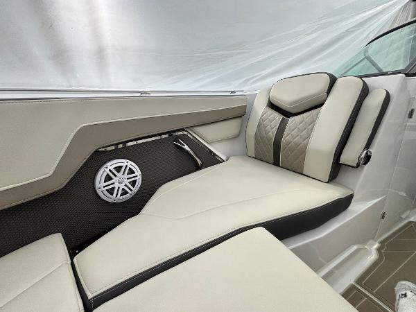 Slide: The Image of Luxurious seating on the 2023 Monterey 275 SS boat with premium upholstery and built-in speaker. - 16