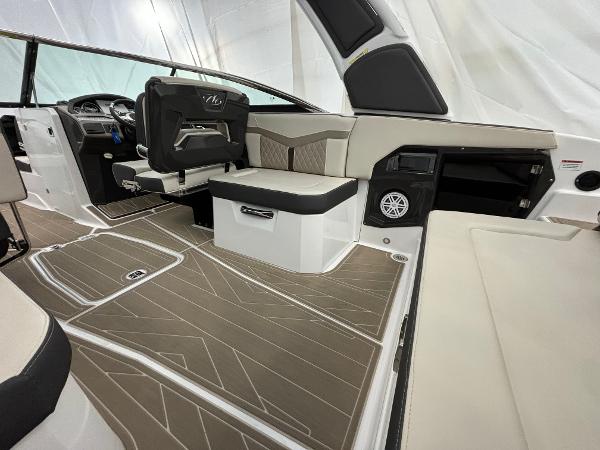 Slide: The Image of 2023 Monterey 275 SS boat interior with modern seating and dashboard. - 5