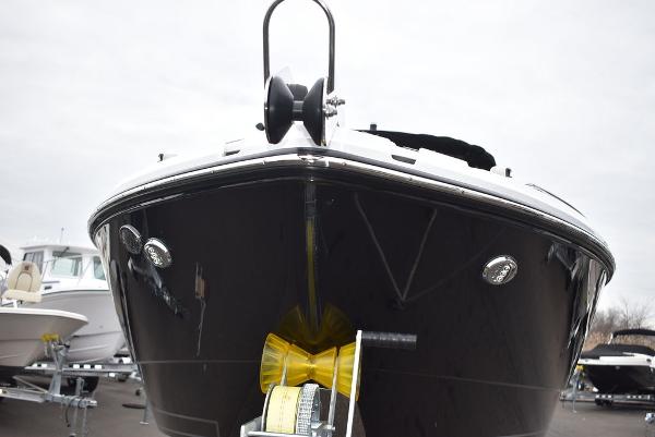 Slide: The Image of 2024 Monterey 275SS boat front view with black hull. - 17