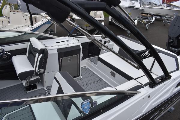 Slide: The Image of 2024 Monterey 275SS boat interior with sleek seating and modern design. - 21
