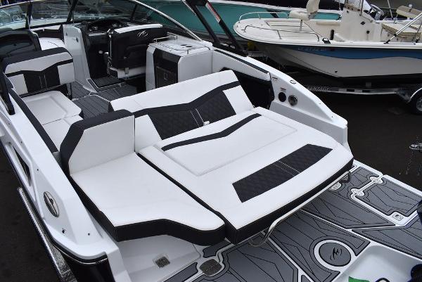 Slide: The Image of 2024 Monterey 275SS boat with luxurious seating and modern design. - 26