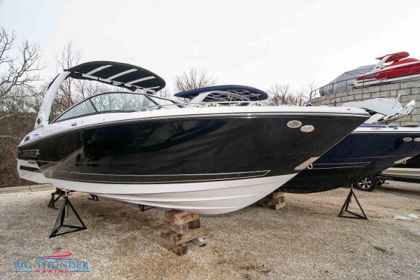 Slide: The Image of 2024 Monterey 278 SS boat on display outdoors. - 0