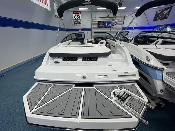 Slide: The Image of 2023 Monterey M-20 boat with swim platform and ladder in showroom. - 7