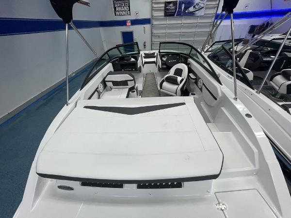 Slide: The Image of 2023 Monterey M-20 boat interior with white seating and modern design. - 9