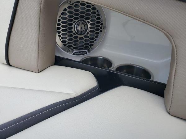 Slide: The Image of 2023 Monterey M-45 boat interior with speaker and cup holders. - 16