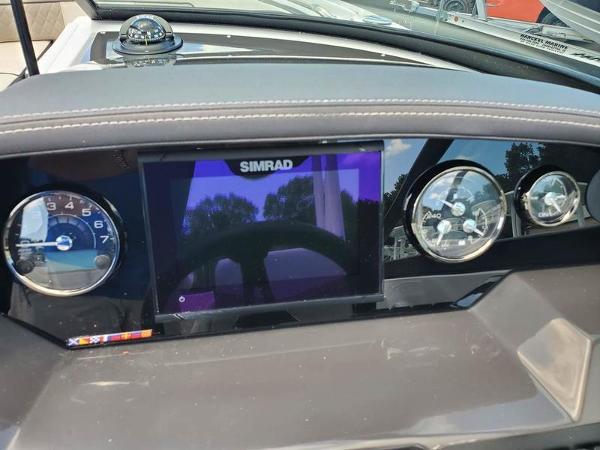 Slide: The Image of Dashboard of 2023 Monterey M-45 boat with Simrad display and gauges. - 17