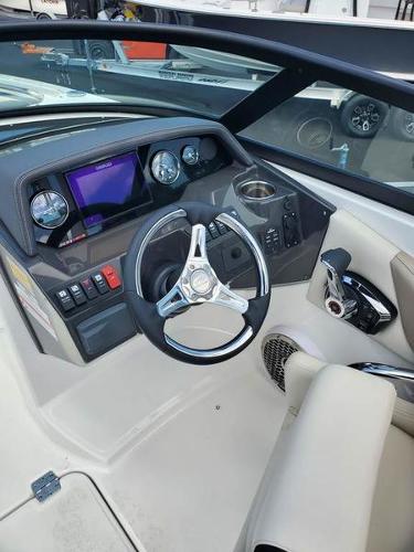 Slide: The Image of 2023 Monterey M-45 boat dashboard with steering wheel and control panel. - 6