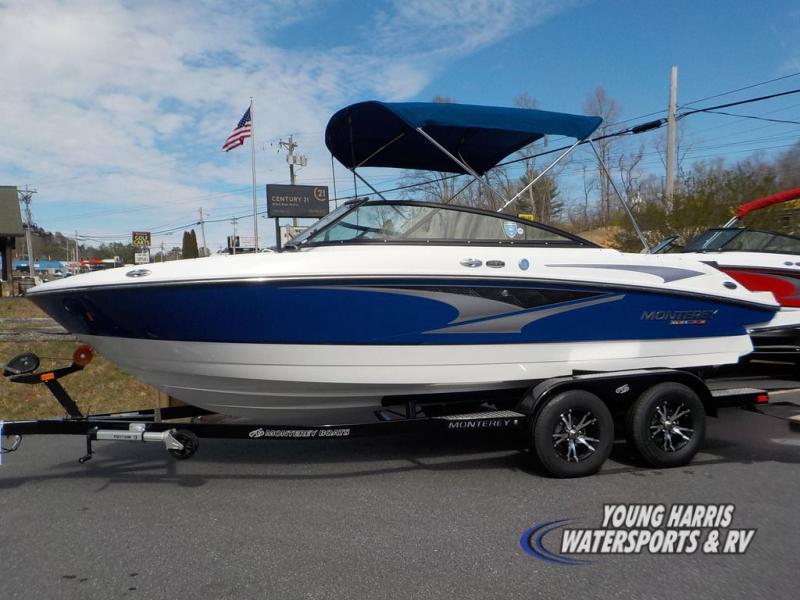 Slide: The Image of 2023 Monterey M20 boat with blue and white exterior on a trailer. - 7