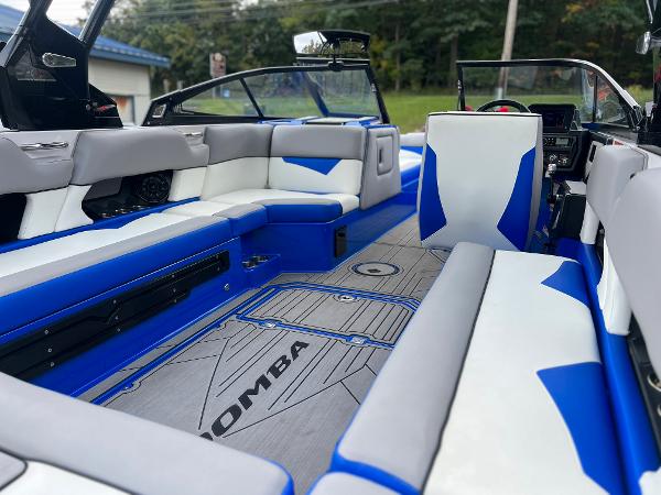 Slide: The Image of 2019 Moomba Makai boat interior with blue and white seating and modern design. - 15
