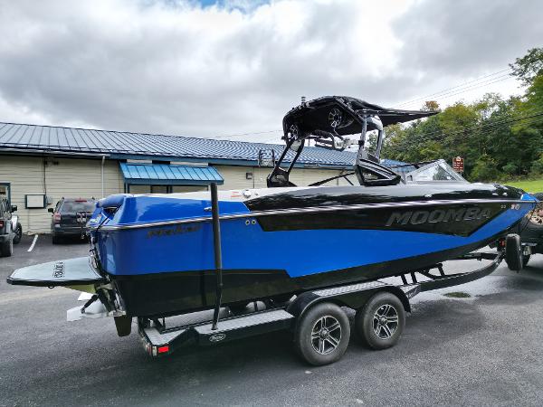 Slide: The Image of 2019 Moomba Makai boat on a trailer in a parking lot. - 4