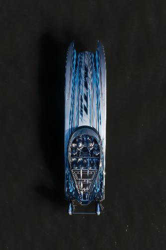 Slide: The Image of Aerial view of a 2025 MTI 440X speedboat on dark water. - 8
