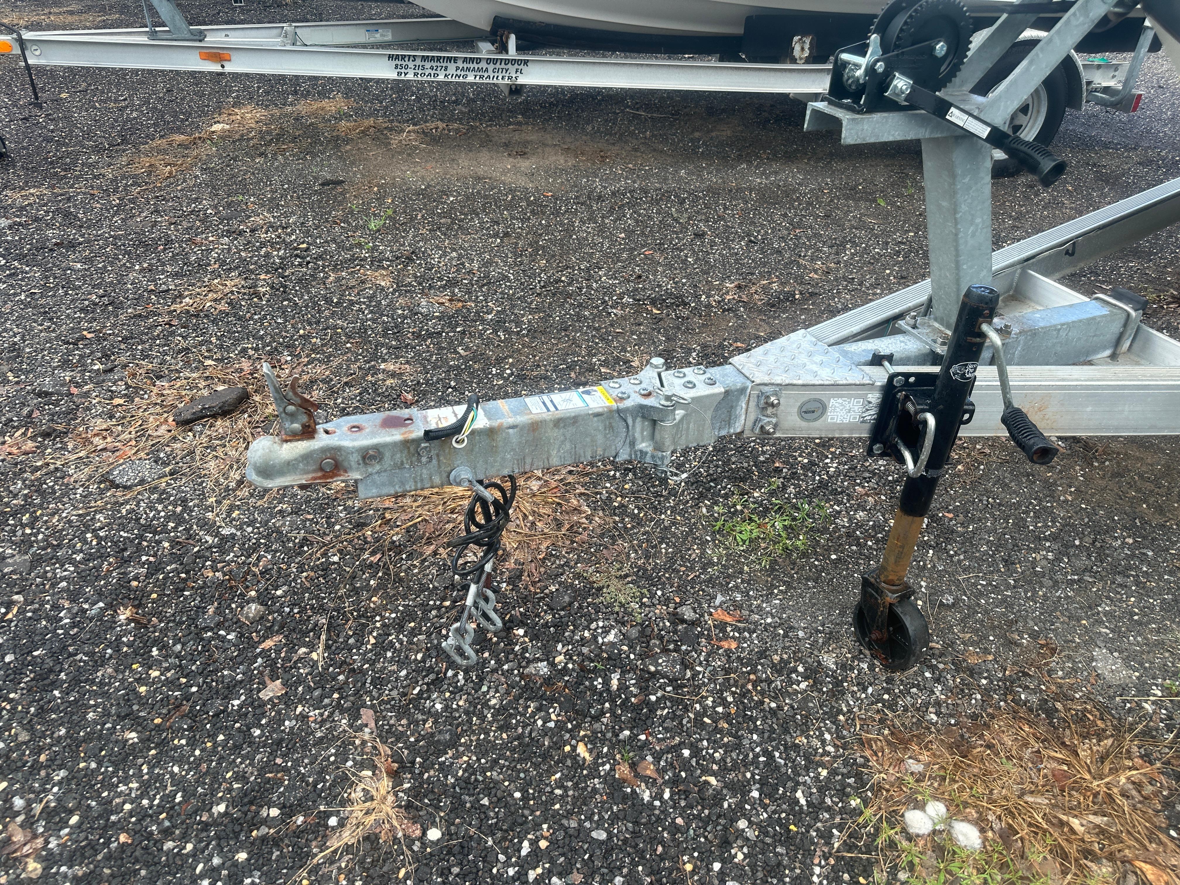 Slide: The Image of Trailer hitch of a 2015 NauticStar 1810 NauticBay on gravel surface. - 25