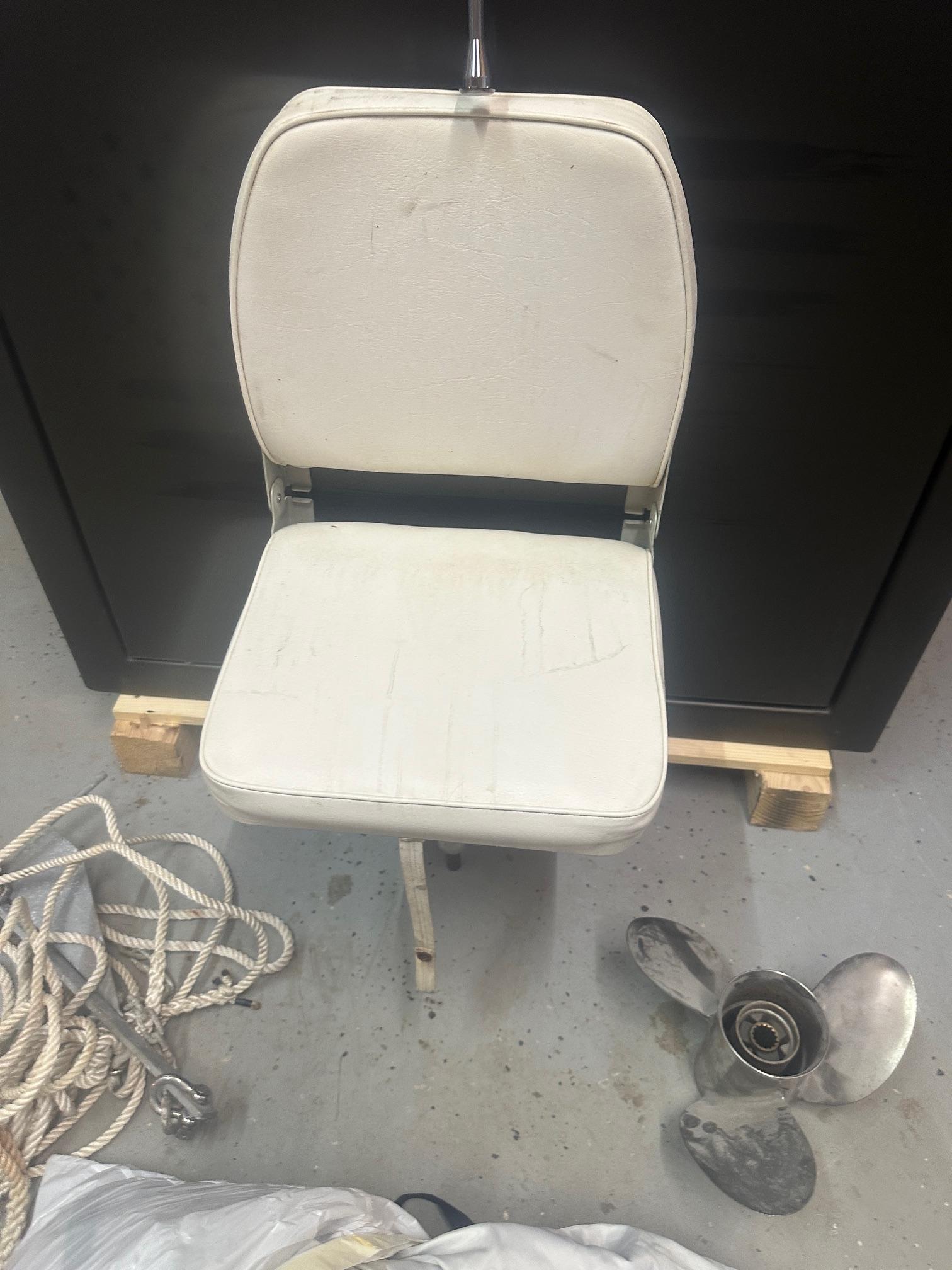 Slide: The Image of White boat seat with rope and propeller, 2015 NauticStar 1810 NauticBay accessories. - 32