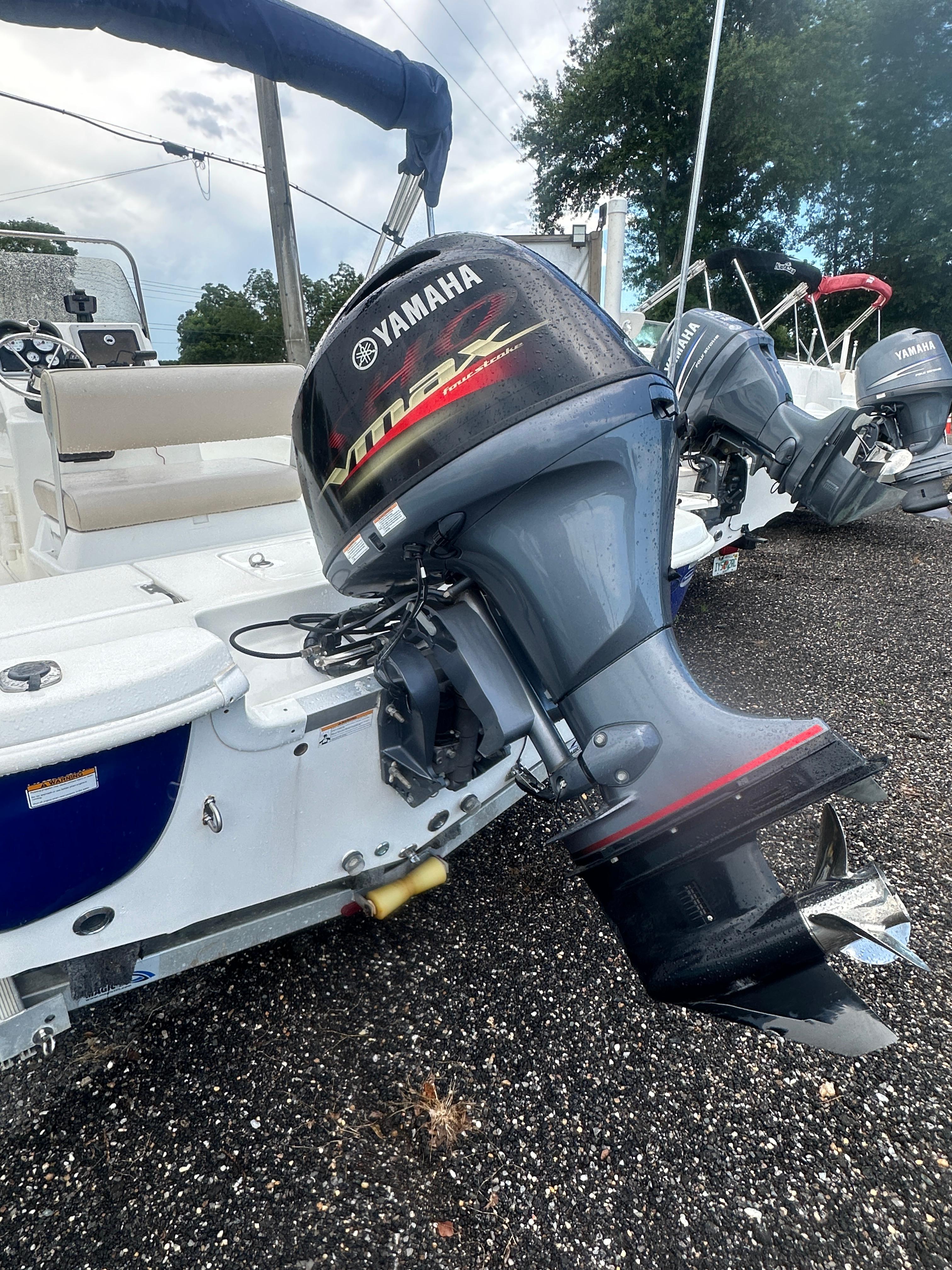 Slide: The Image of 2015 NauticStar 1810 NauticBay boat with Yamaha outboard motor on gravel surface. - 6