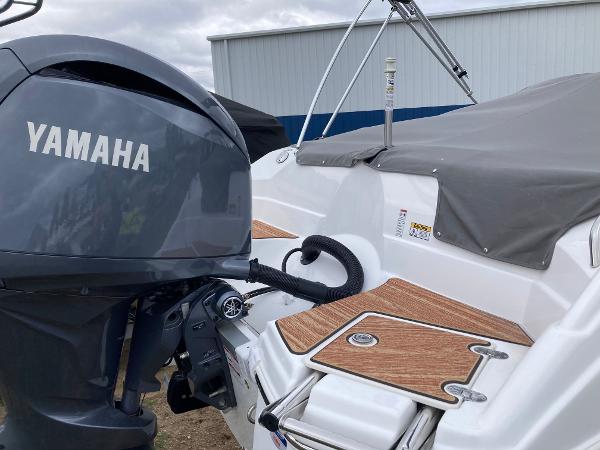 Slide: The Image of 2024 NauticStar 223 DC boat with Yamaha outboard motor. - 5