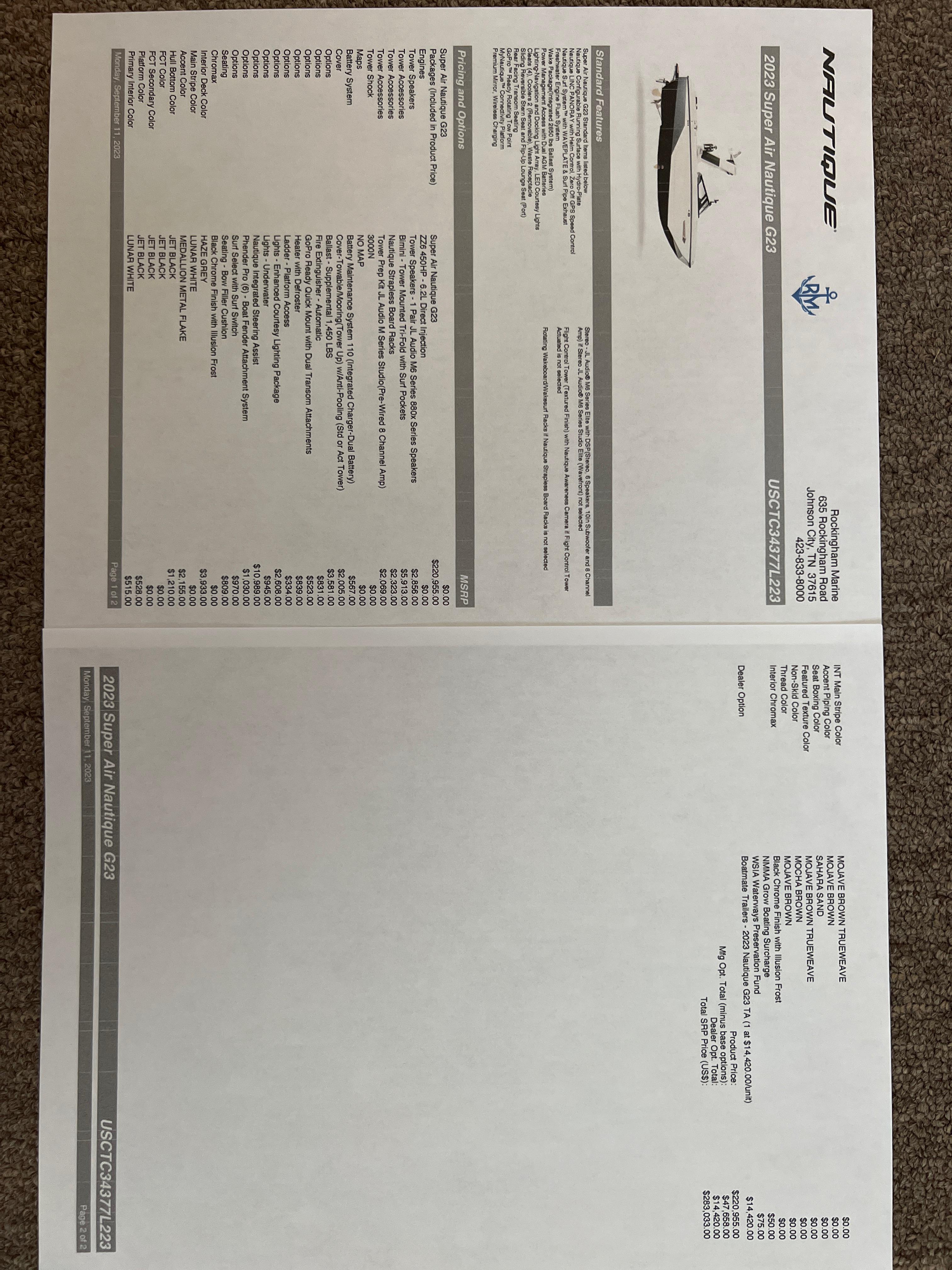 Slide: The Image of 2023 Nautique G23 boat specifications and pricing details on printed document. - 35