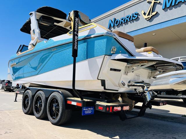 Slide: The Image of 2024 Nautique G25 Paragon boat on trailer at Norris Marine dealership. - 7
