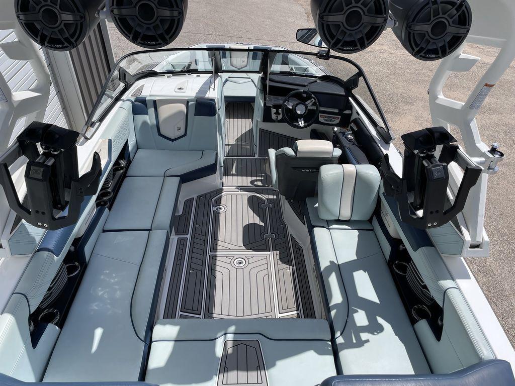 Slide: The Image of 2019 Nautique Super Air Nautique G23 interior with premium seating and advanced audio system. - 3