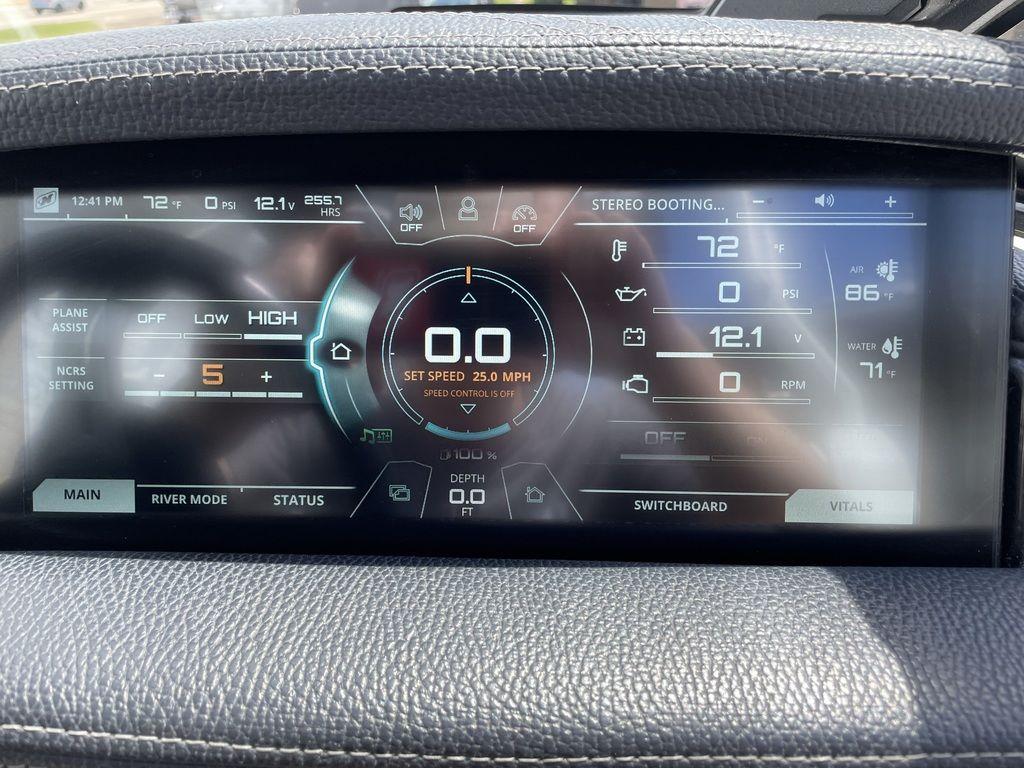 Slide: The Image of 2019 Nautique Super Air Nautique G23 dashboard display showing various boat vitals and settings. - 7
