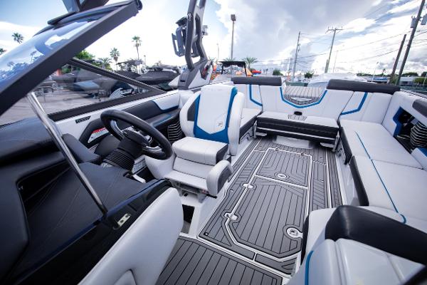 Slide: The Image of 2018 Nautique Super Air Nautique G23 Coastal Edition interior, luxury seating and advanced controls. - 12