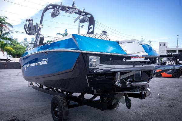 Slide: The Image of 2018 Nautique Super Air Nautique G23 Coastal Edition boat on trailer. - 23