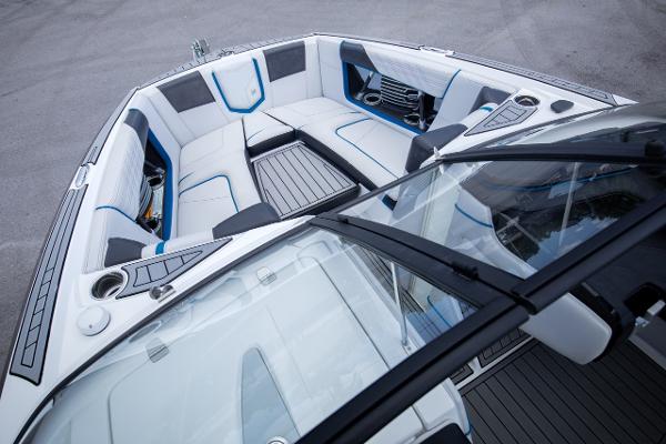 Slide: The Image of 2018 Nautique Super Air Nautique G23 Coastal Edition boat interior, spacious seating. - 7