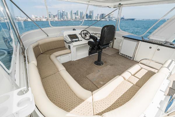 Slide: The Image of Luxurious 2008 Navigator 62 Pilothouse yacht interior with city skyline view. - 11