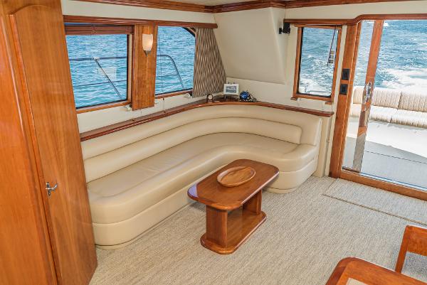 Slide: The Image of Luxurious interior of 2008 Navigator 62 Pilothouse yacht with leather seating and wooden accents. - 26