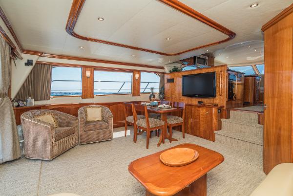 Slide: The Image of Luxurious interior of 2008 Navigator 62 Pilothouse yacht with elegant wood finishes and comfortable seating. - 28