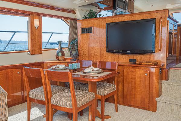 Slide: The Image of Luxurious interior of 2008 Navigator 62 Pilothouse yacht with dining area and TV. - 29