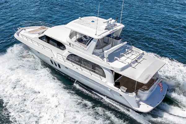 Slide: The Image of 2008 Navigator 62 Pilothouse yacht cruising on open water. - 3