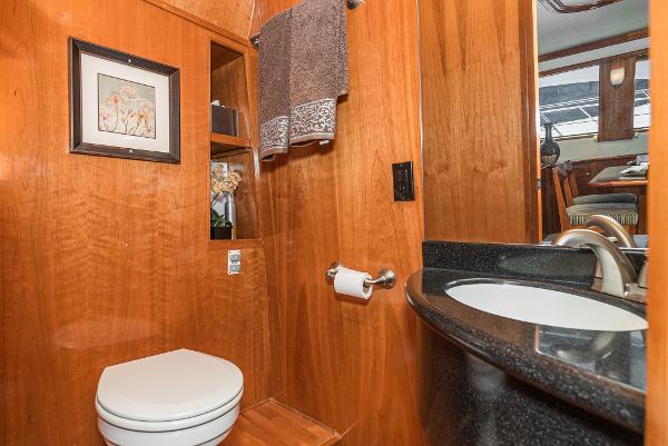 Slide: The Image of Luxurious bathroom in 2008 Navigator 62 Pilothouse yacht with wood paneling and modern fixtures. - 31