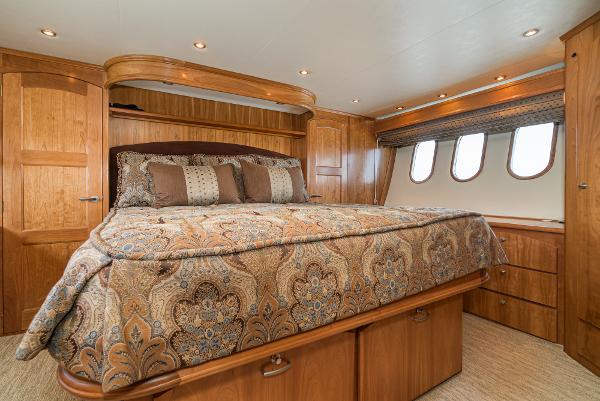 Slide: The Image of Luxurious bedroom interior of 2008 Navigator 62 Pilothouse yacht with elegant wood finish. - 43