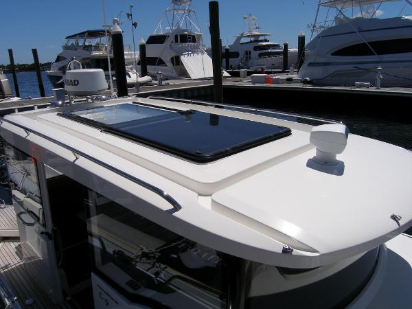 Slide: The Image of Nimbus C9 2025 model yacht docked at marina with other luxury boats. - 3