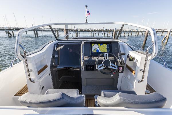 Slide: The Image of Nimbus T9 2025 boat cockpit with modern navigation system and steering wheel. - 3