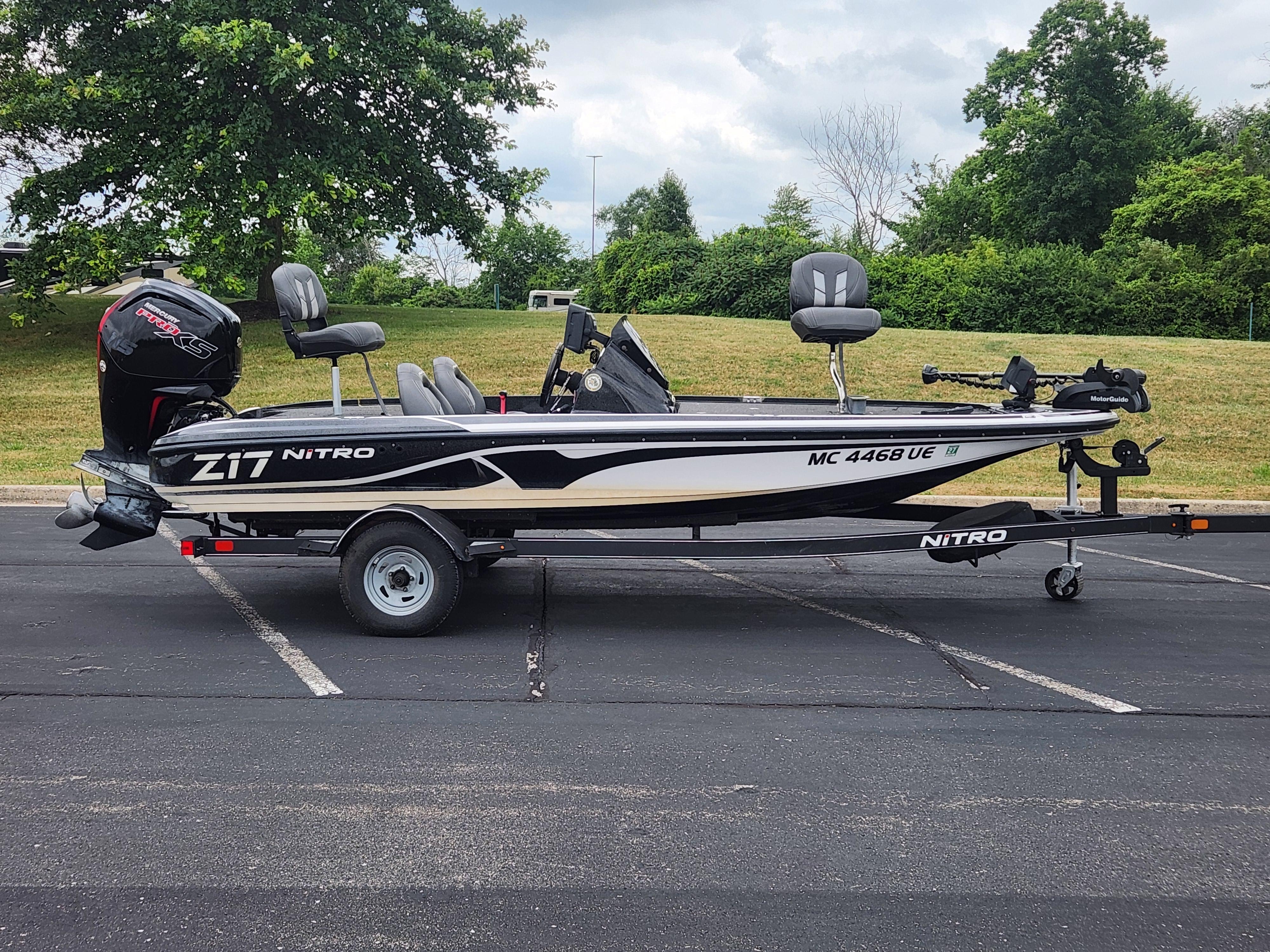 Slide: The Image of 2017 Nitro Z17 fishing boat on trailer in parking lot. - 1