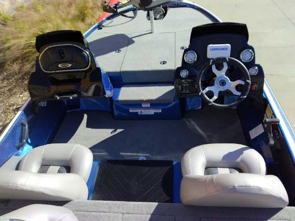 Slide: The Image of 2024 Nitro Z17 boat interior with steering wheel and seating. - 10