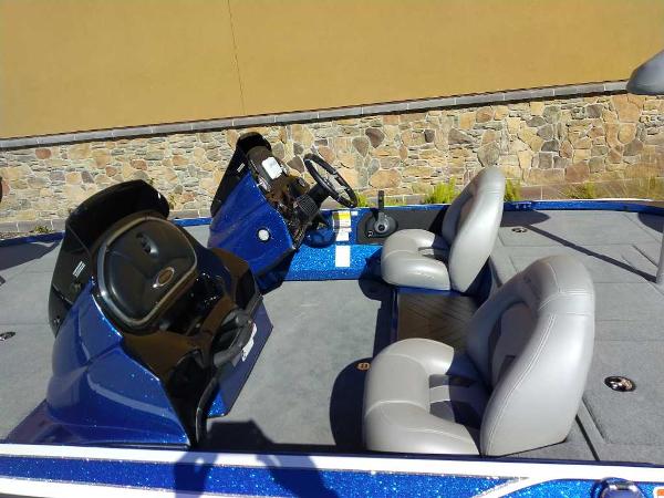 Slide: The Image of 2024 Nitro Z17 boat interior with dual seats and steering console. - 11