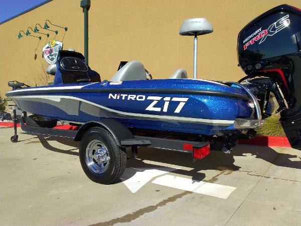 Slide: The Image of 2024 Nitro Z17 boat with Mercury Pro XS engine on trailer. - 2